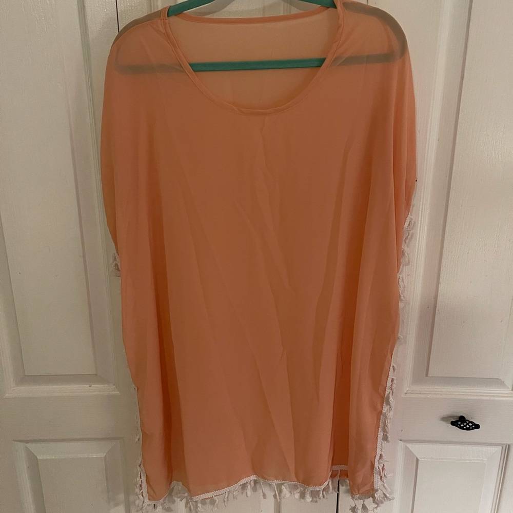 Woman’s bathing suit cover up
